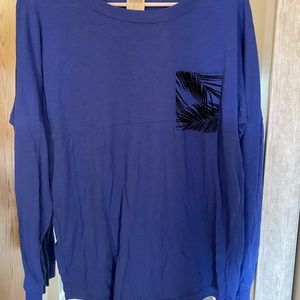 Pink long sleeve shirt. Size small but fits like a M/L